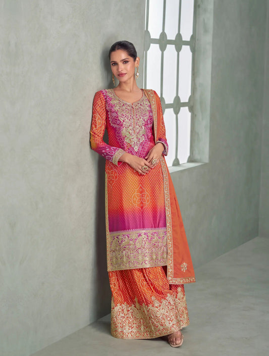 Salwar Palazzo en soie chinon avec broderies et motifs orange vif et rose fuchsia bicolore COLLECTION AMREEN