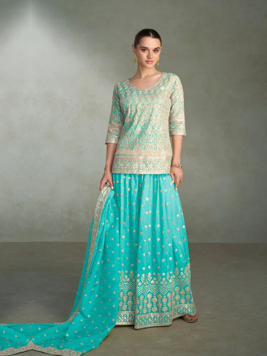 Salwar Palazzo en soie scintillante bleu turquoise avec broderies faites main COLLECTION SITARAA