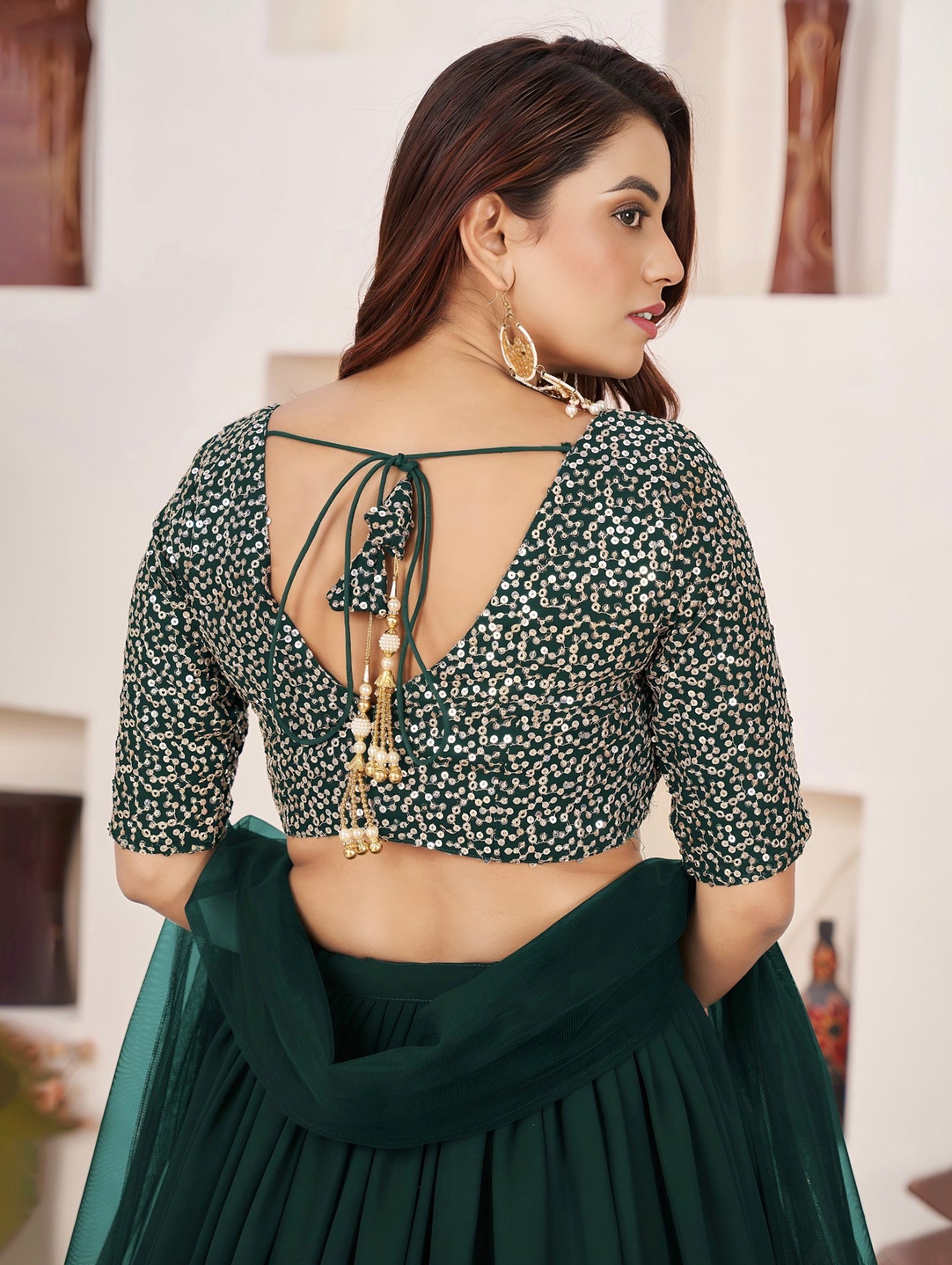 Lehenga vert foncé de fête en georgette et broderies travaillées COLLECTION ANJALI