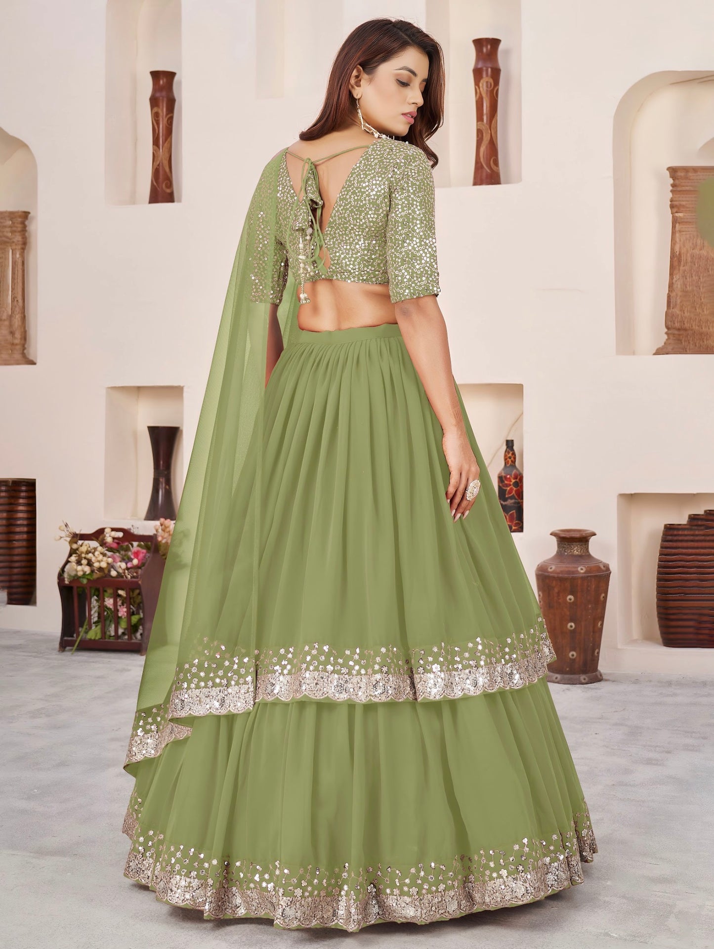 Lehenga vert olive de fête en georgette et broderies travaillées COLLECTION ANJALI