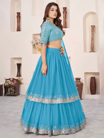 Lehenga bleu ciel de fête en georgette et broderies travaillées COLLECTION ANJALI
