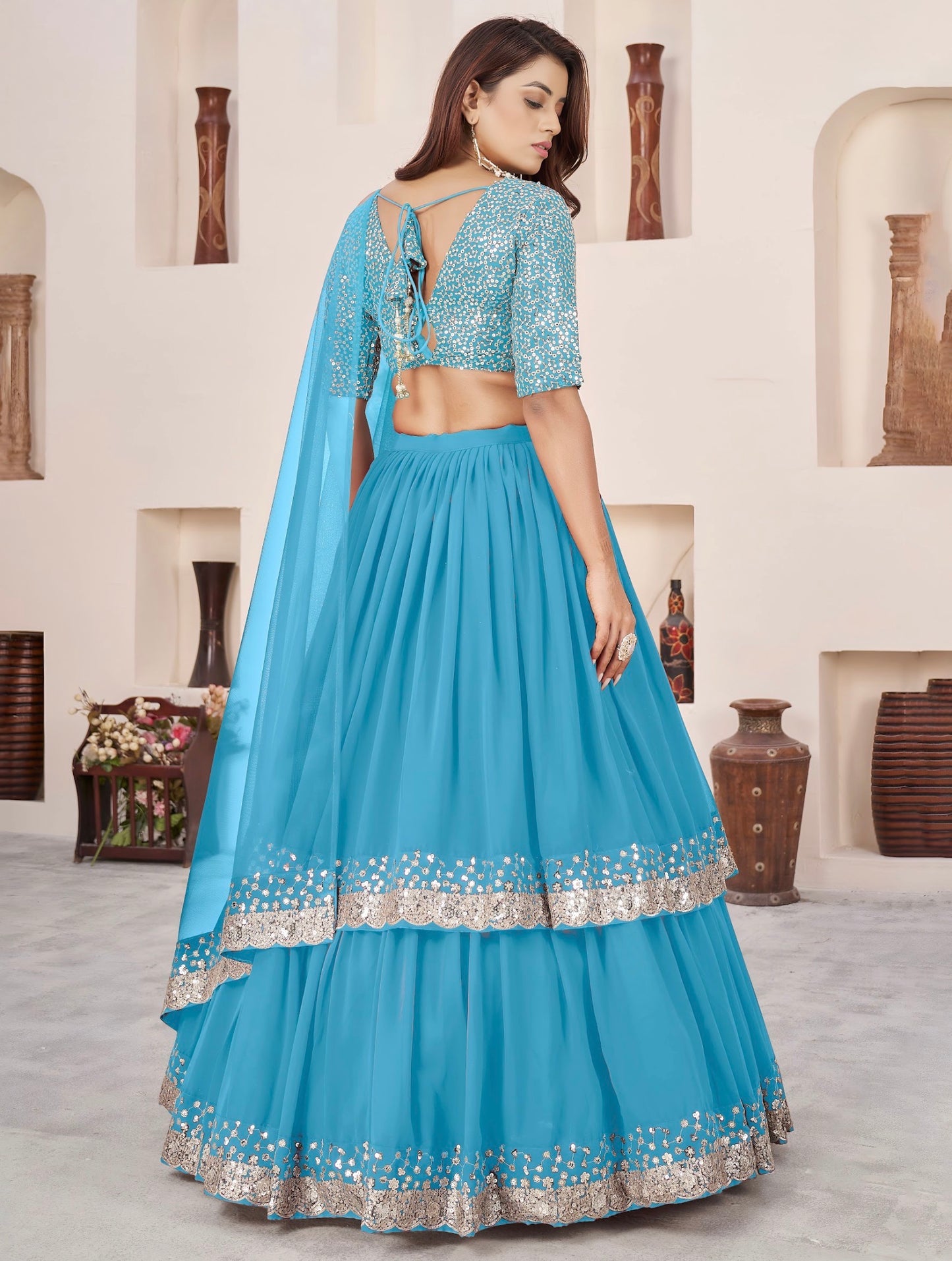 Lehenga bleu ciel de fête en georgette et broderies travaillées COLLECTION ANJALI