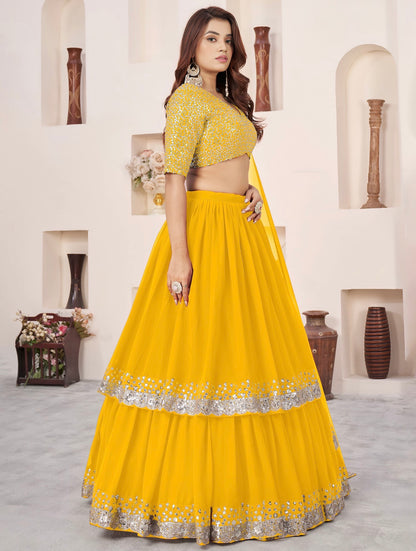 Lehenga jaune flamboyant de fête en georgette et broderies travaillées COLLECTION ANJALI