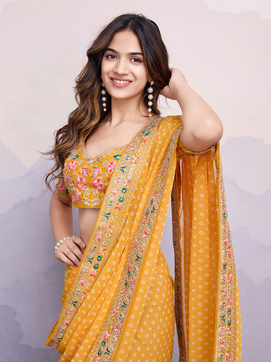 Green glass silk sari with multi-colored red floral blouse and digital print, sequin and thread embroidery