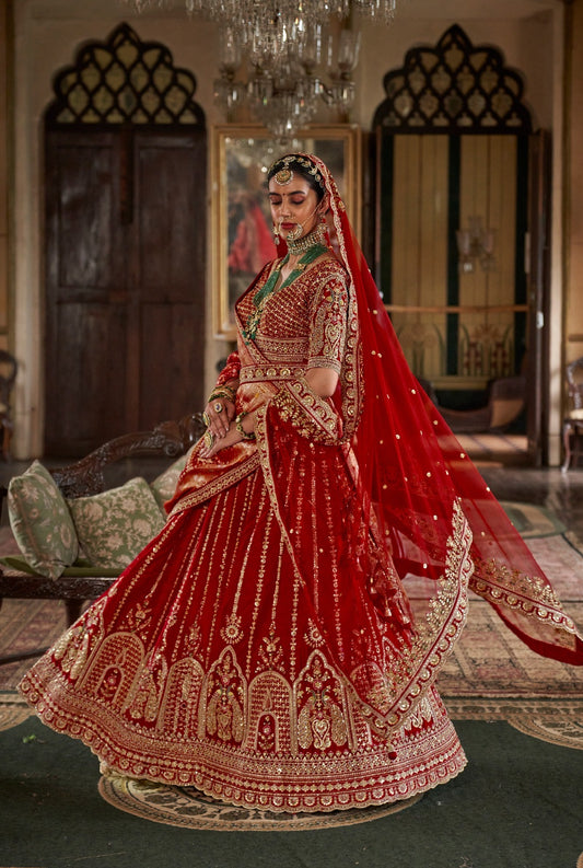 Lehenga de mariée rouge riche inspiration de créateur COLLECTION SAJYA