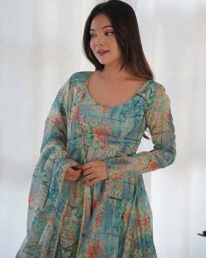 Blue-green organza dress with multi-colored floral print