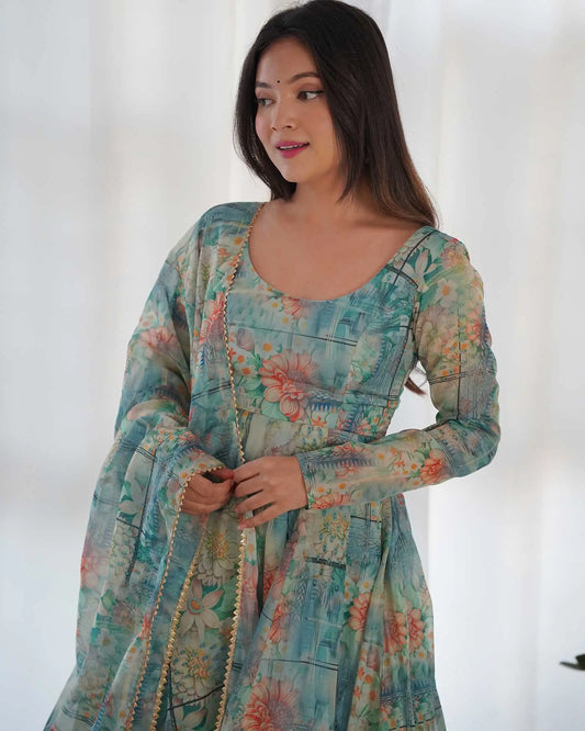 Blue-green organza dress with multi-colored floral print
