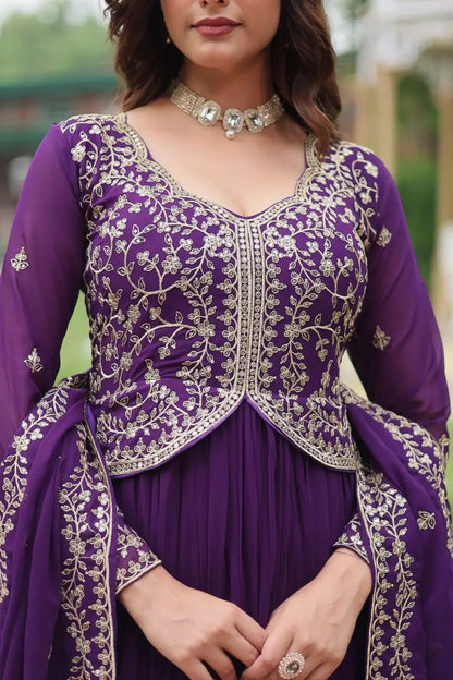 Dark purple georgette dress with zari embroidery and multiple sequins, accompanied by a dupatta