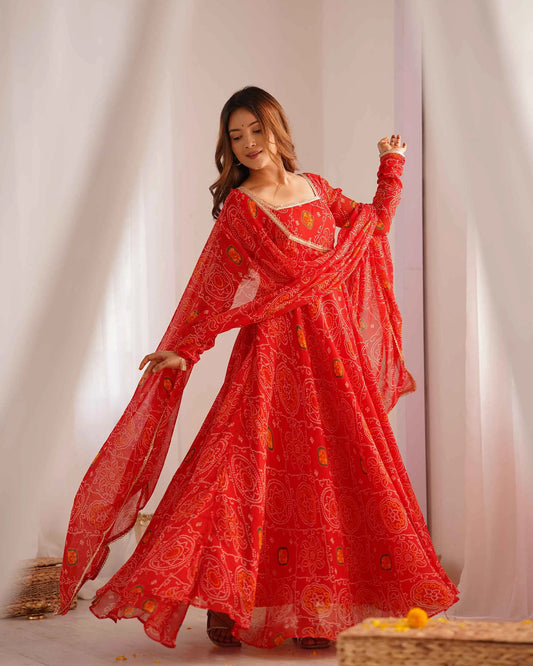 Ruby red long Anarkali dress in soft and light chiffon with Bandhej print