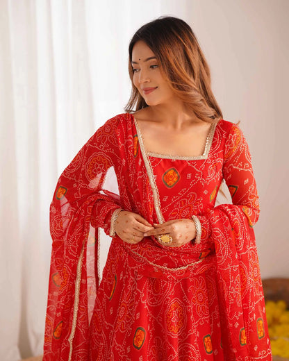 Ruby red long Anarkali dress in soft and light chiffon with Bandhej print