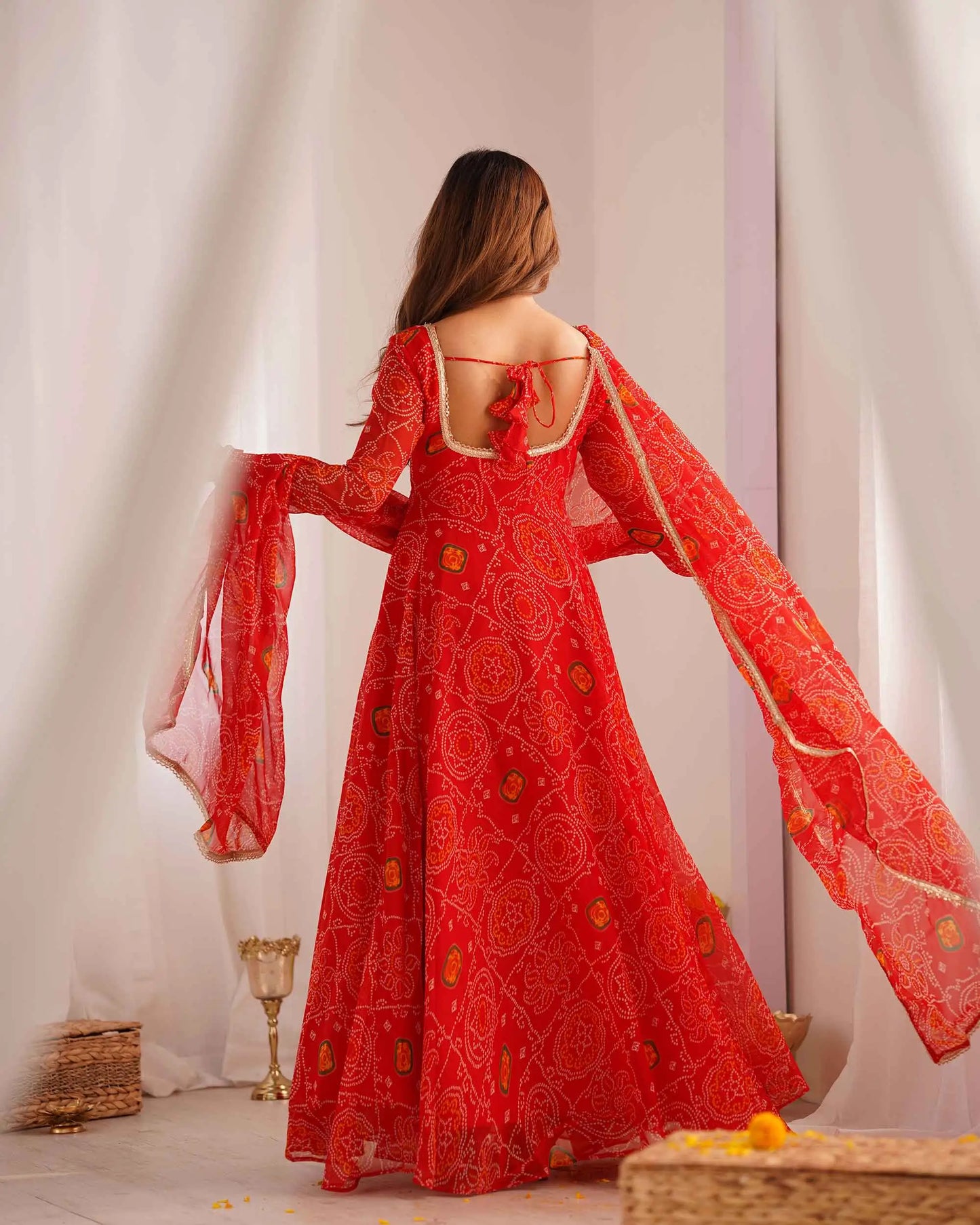 Ruby red long Anarkali dress in soft and light chiffon with Bandhej print