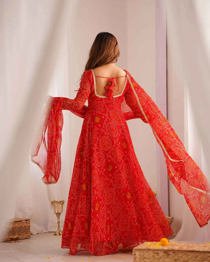 Ruby red long Anarkali dress in soft and light chiffon with Bandhej print