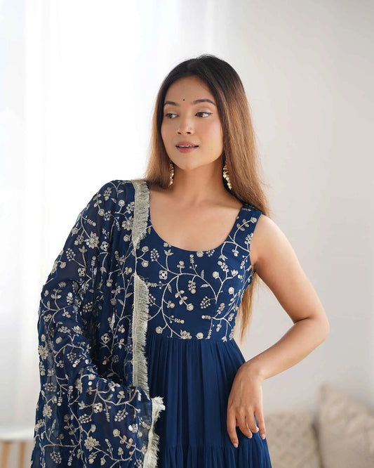 Teal blue georgette empire flair gown with heavy embroidered dupatta