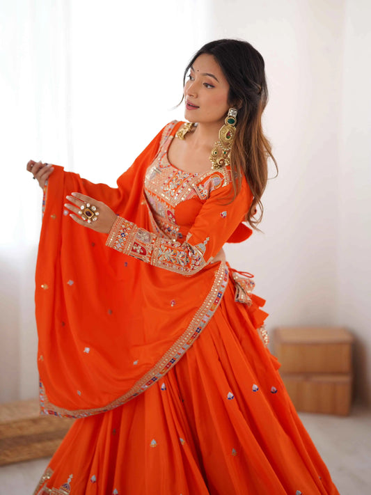 Lehenga orange intense avec broderie cording dori, accompagné d’un dupatta