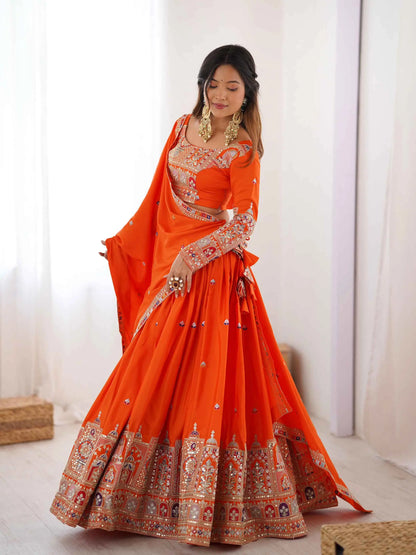 Lehenga orange intense avec broderie cording dori, accompagné d’un dupatta