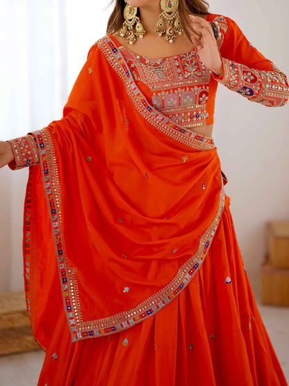 Lehenga orange intense avec broderie cording dori, accompagné d’un dupatta