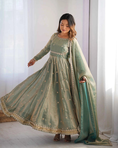 Shiny olive green designer dress with cording and sequin embroidery, accompanied by a matching dupatta