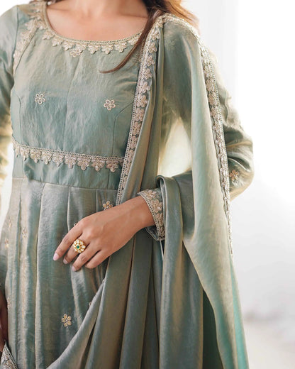 Shiny olive green designer dress with cording and sequin embroidery, accompanied by a matching dupatta
