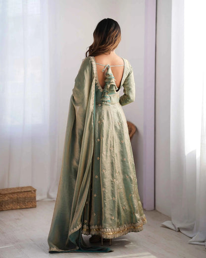 Shiny olive green designer dress with cording and sequin embroidery, accompanied by a matching dupatta
